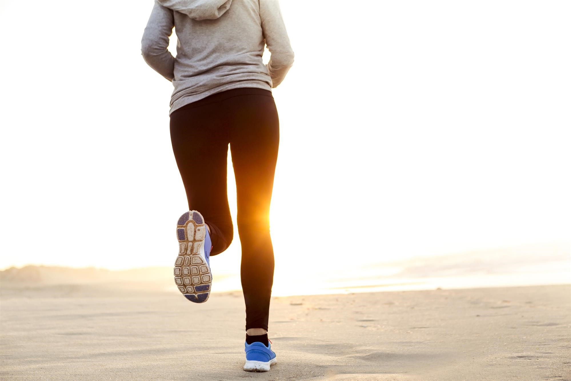 woman running on the beach